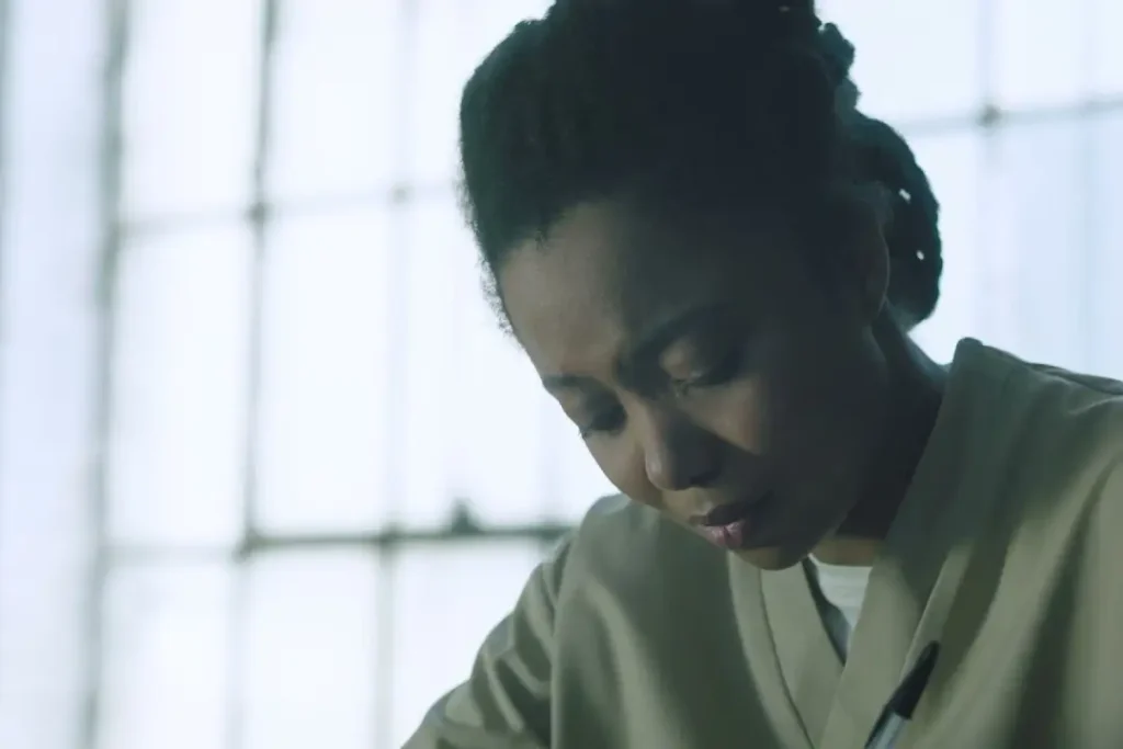 A woman looking down.