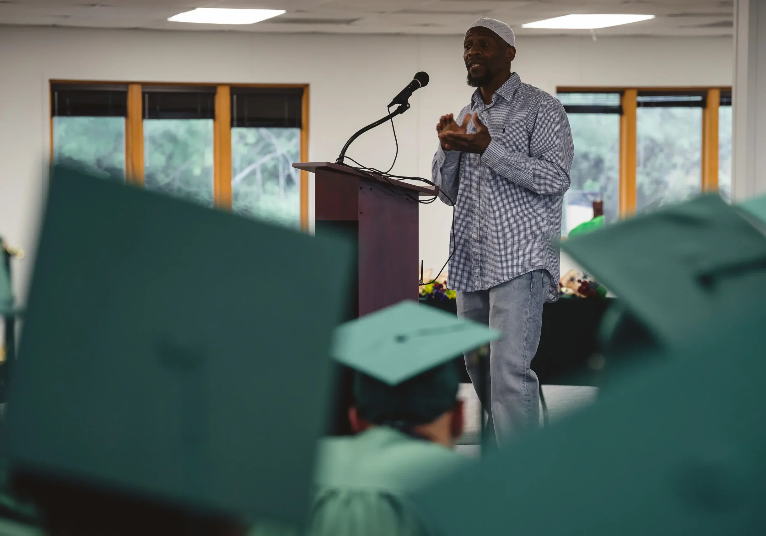 Man speaking at graduation